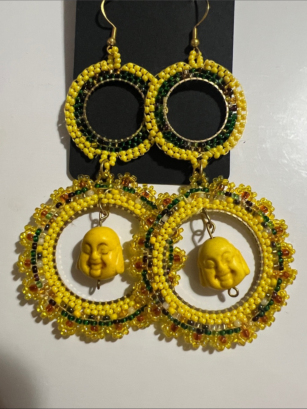 Yellow Beaded Hoop Earrings with Buddha Charm